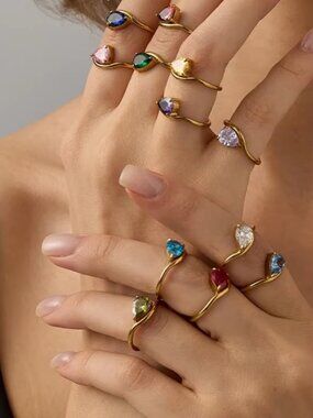 Size 7 18k teardrop gold stainless steel rings